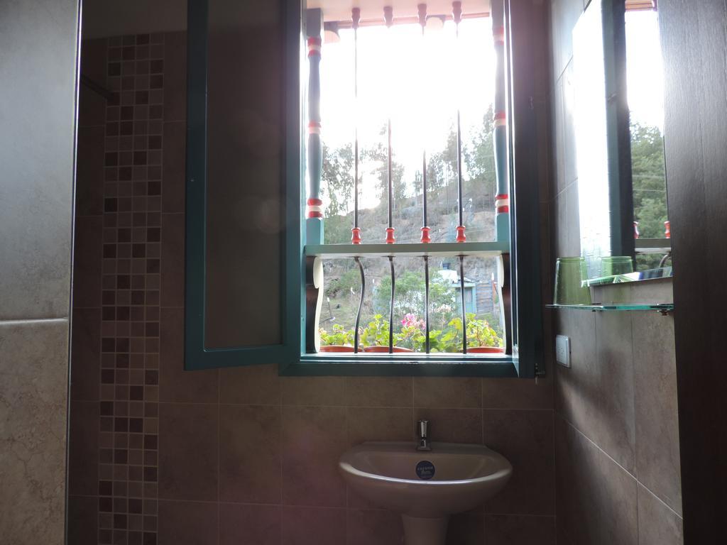 Hotel Los Geranios Duitama Szoba fotó